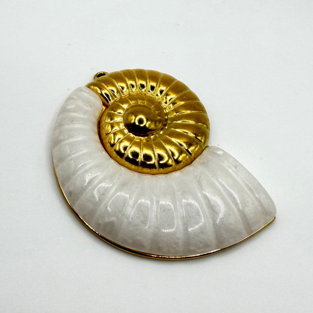 Golden conch shell charm