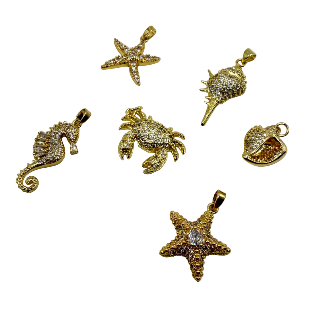 Golden glitter charm