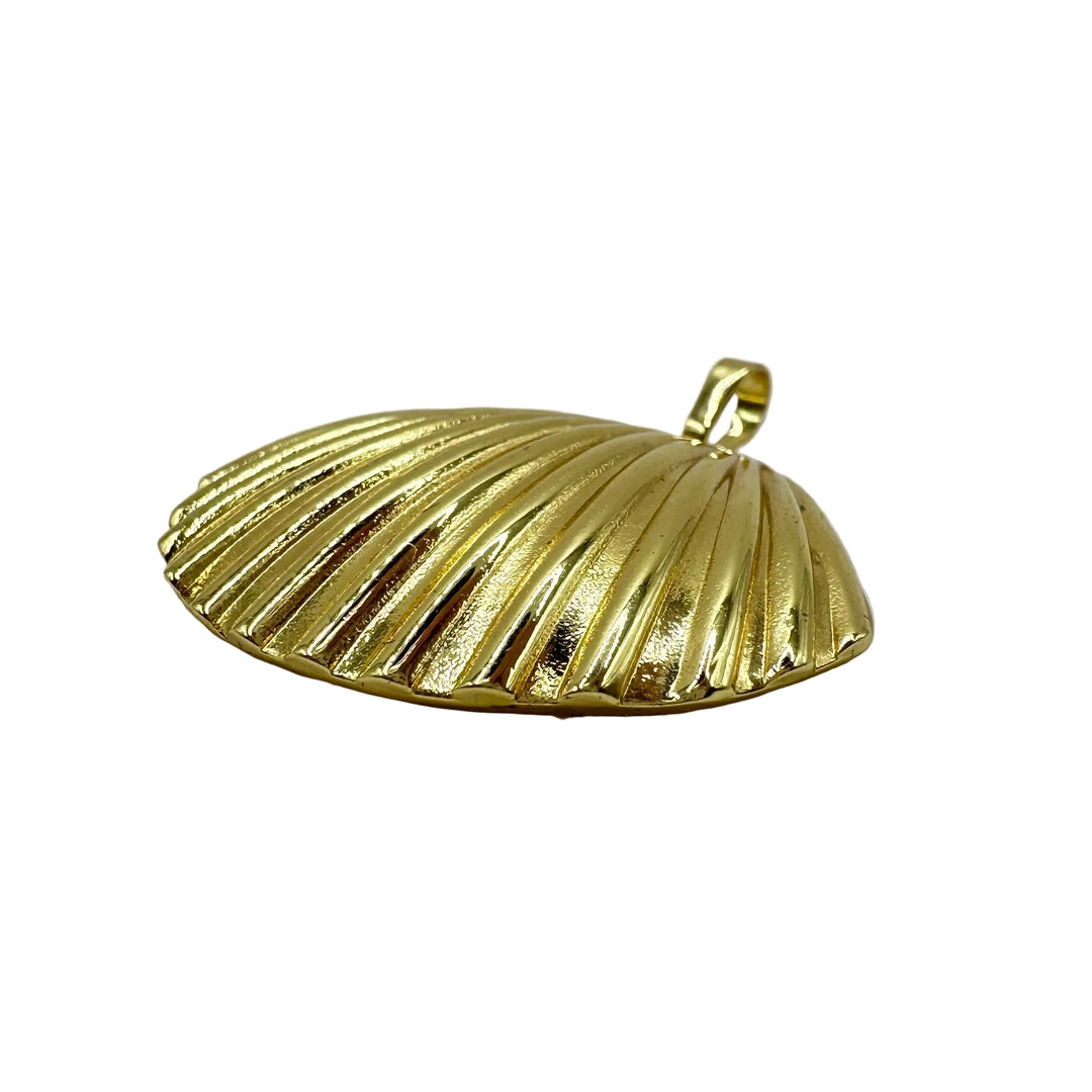 Golden shell charm
