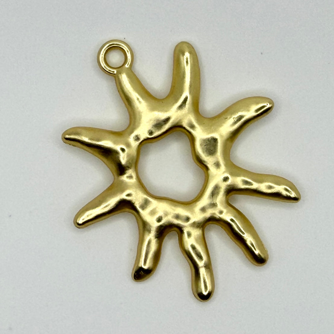 Abstract sun charm