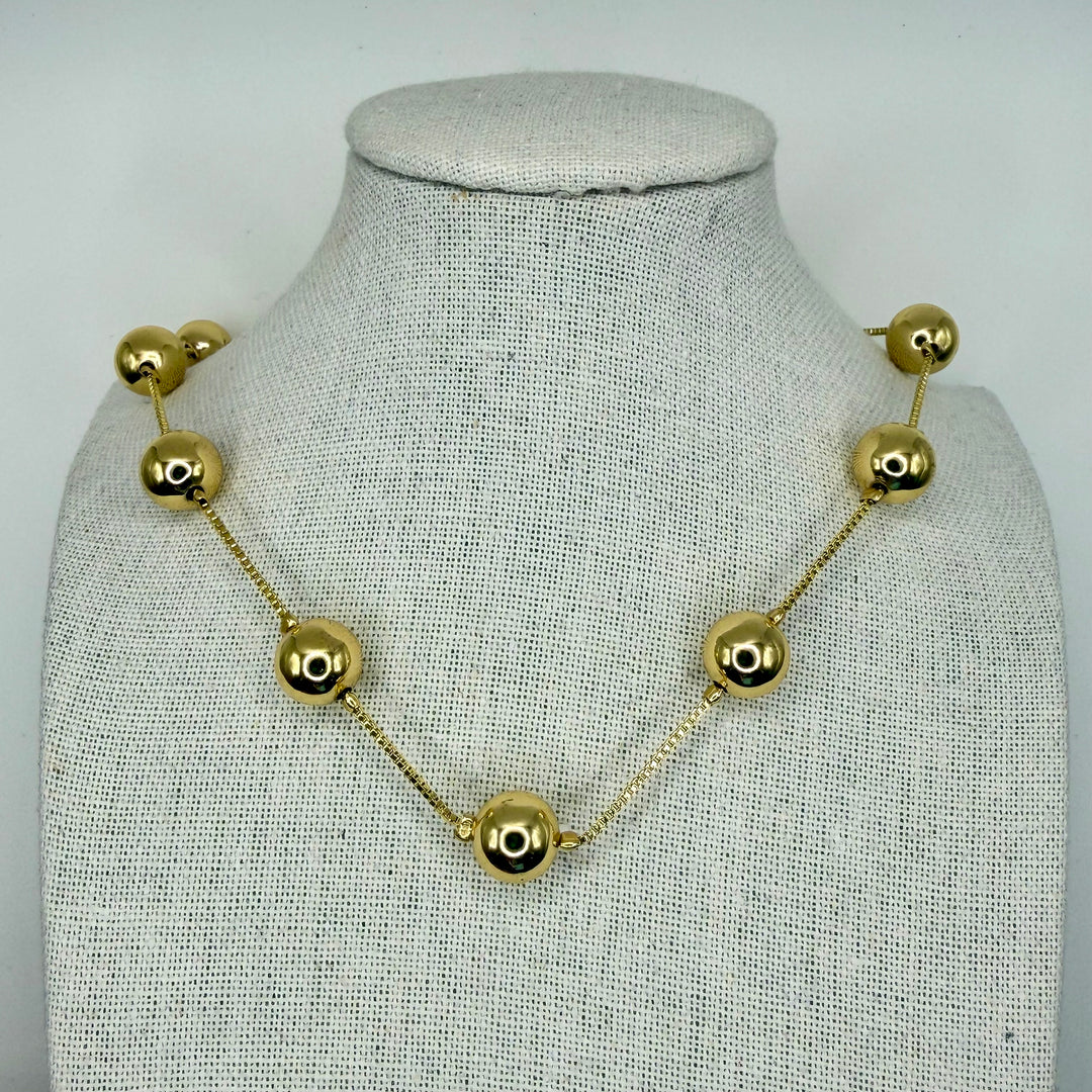 Golden medium dots necklace