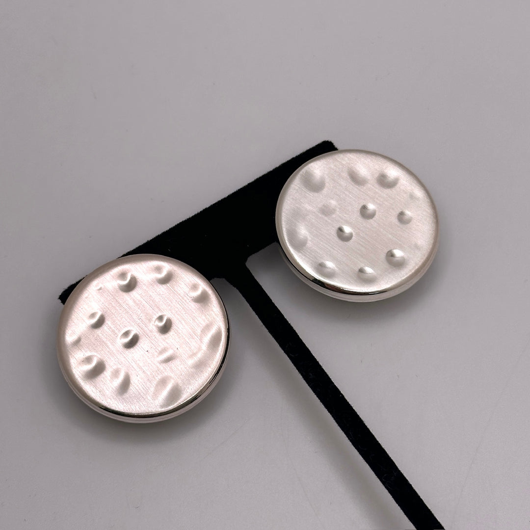 Saturn Silver Studs