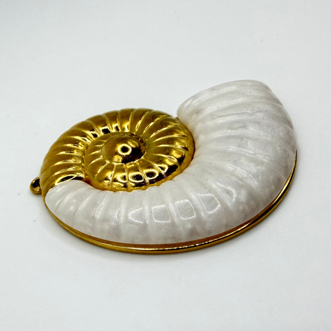 Golden conch shell charm