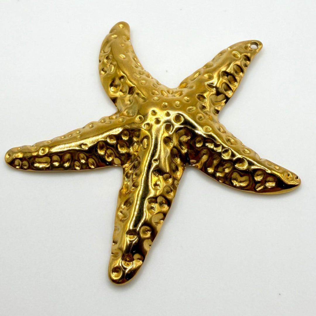 Golden starfish charm