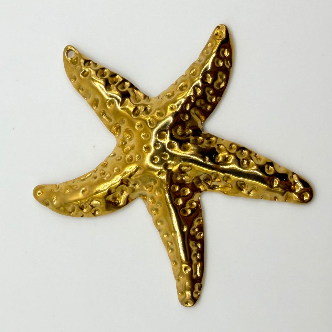 Golden starfish charm