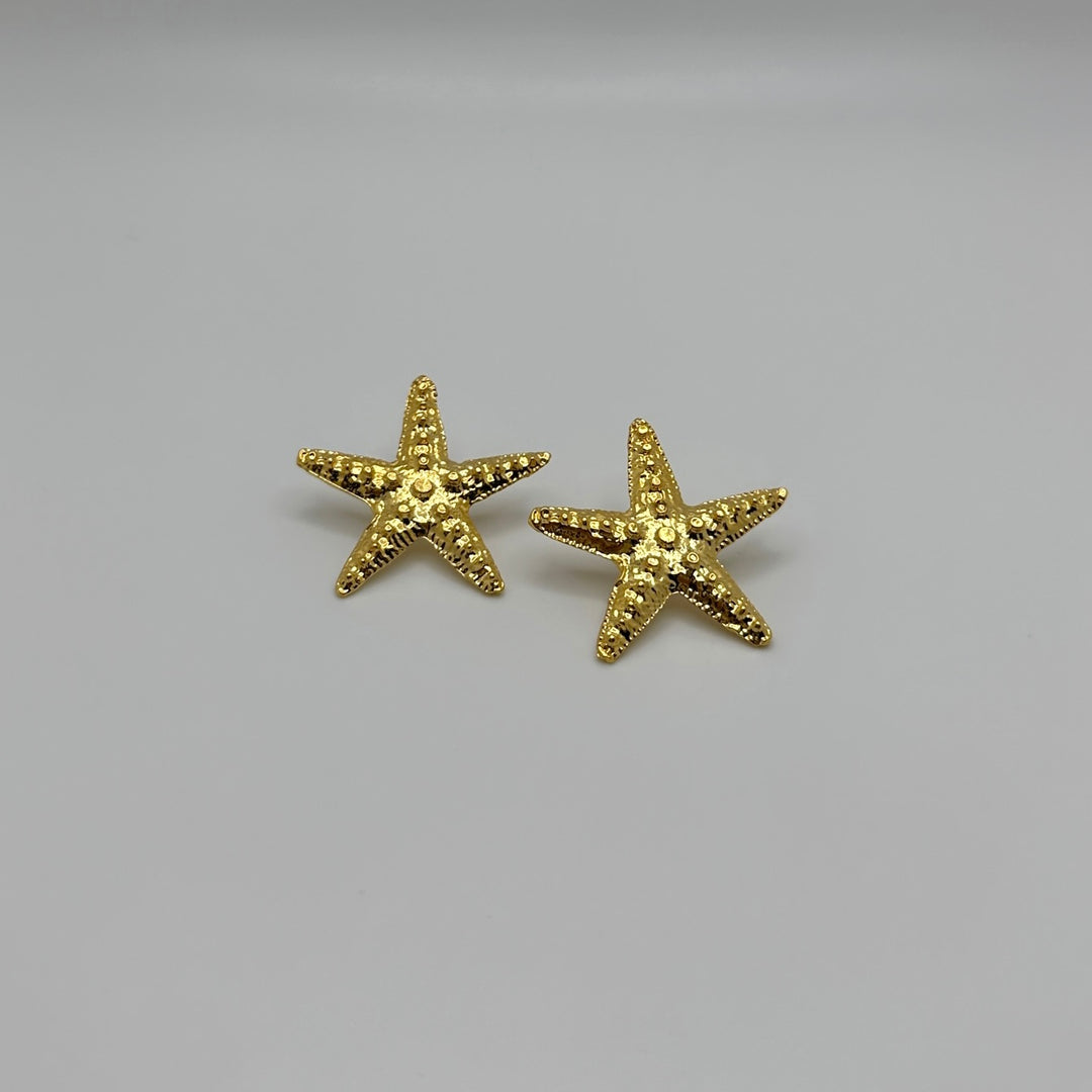 Oceanía Studs